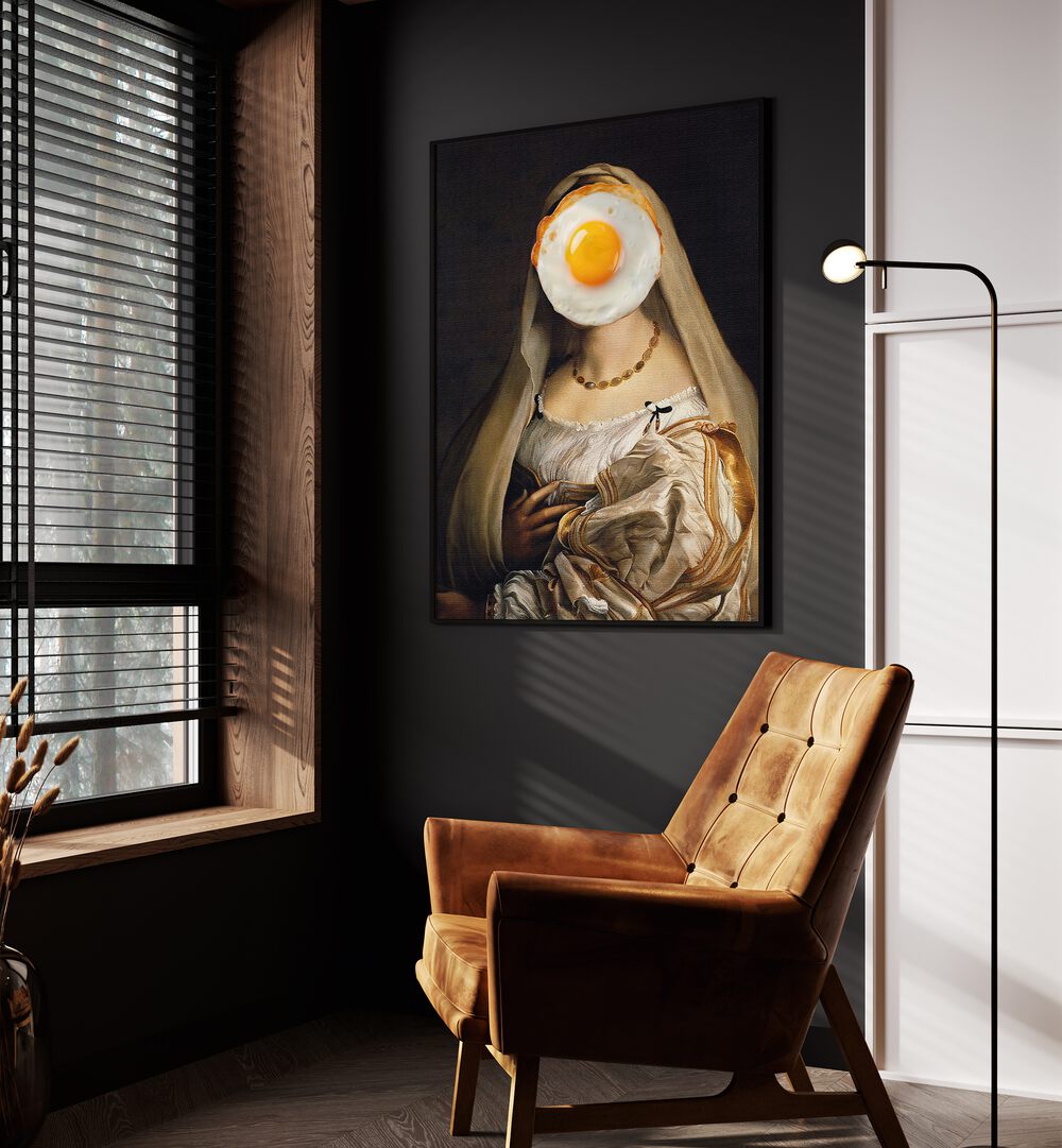 English Breakfast I by the Art Concept Altered Art Prints in Black Plain Frame placed on a wall beside an orange sofa