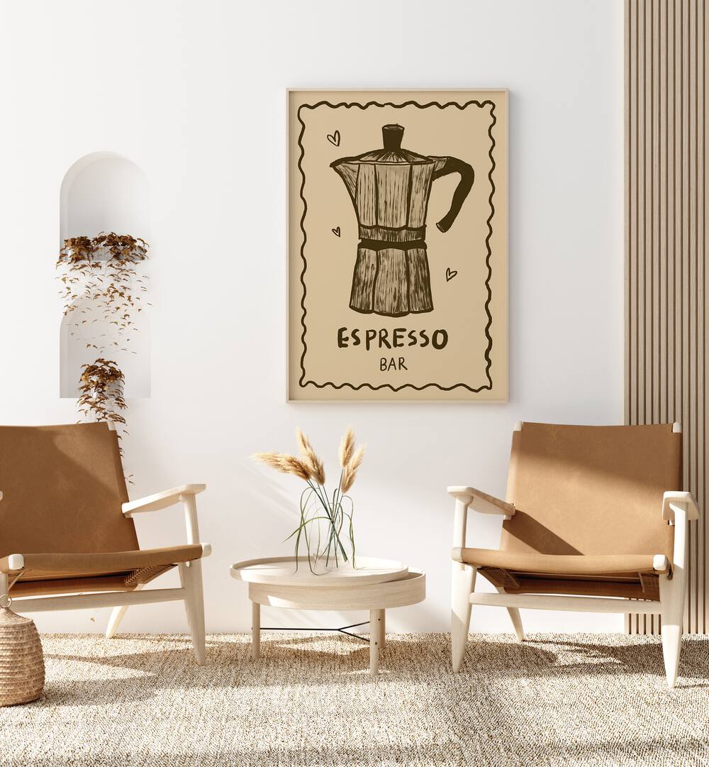 Espresso Bar by Studio Dolci Kitchen Art Prints in Oak Wood Plain Frame placed on a wall behind two chairs and a table