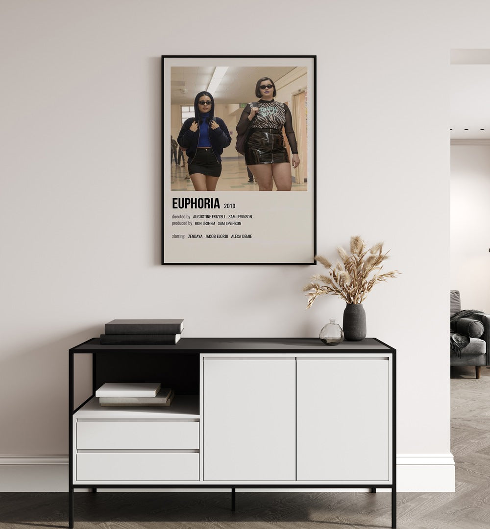Euphoria 2019 II Movie Posters in Black Plain Frame placed on a white wall behind a black and white table