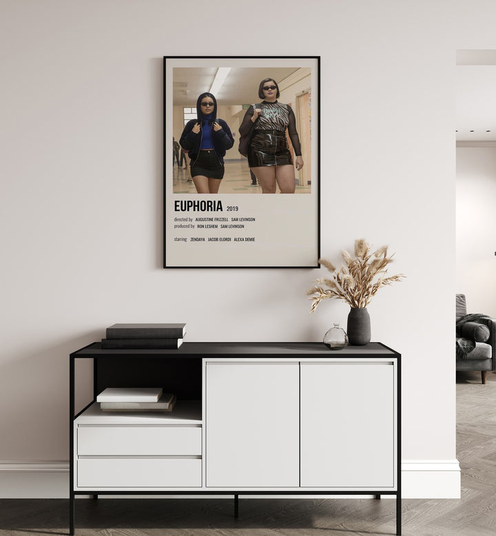 Euphoria 2019 II Movie Posters in Black Plain Frame placed on a white wall behind a black and white table
