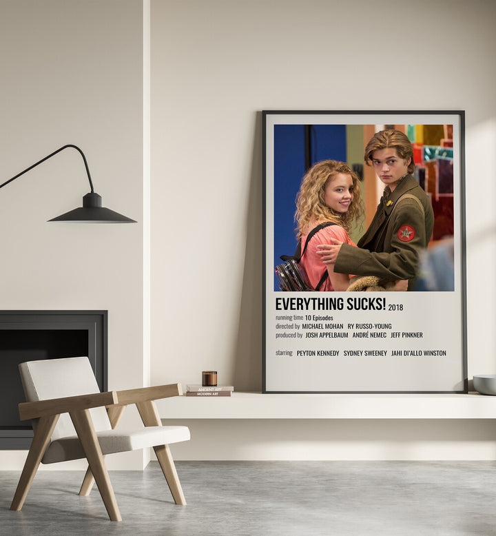 Everything Sucks 2018 I Movie Posters in Black Plain Frame placed on a shelf beside a hearth