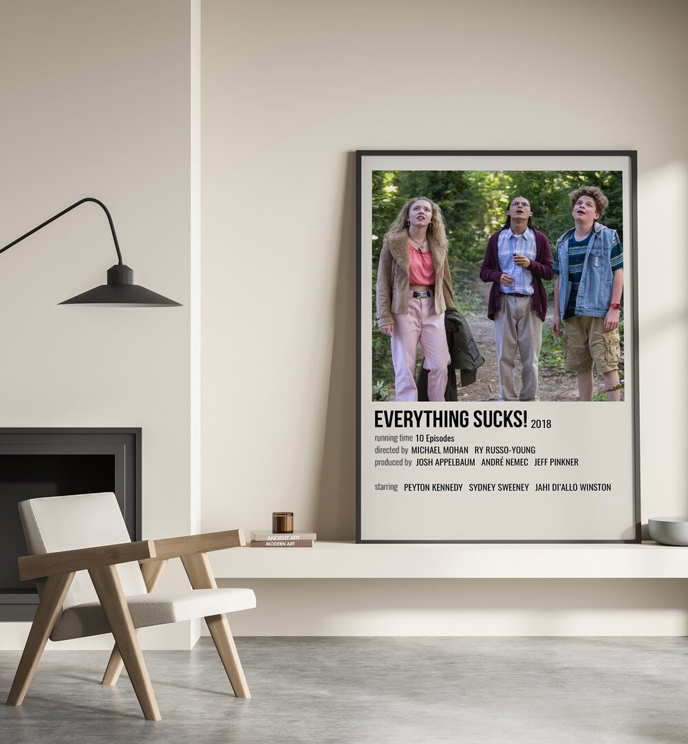 Everything Sucks 2018 II Movie Posters in Black Plain Frame placed on a shelf beside a hearth