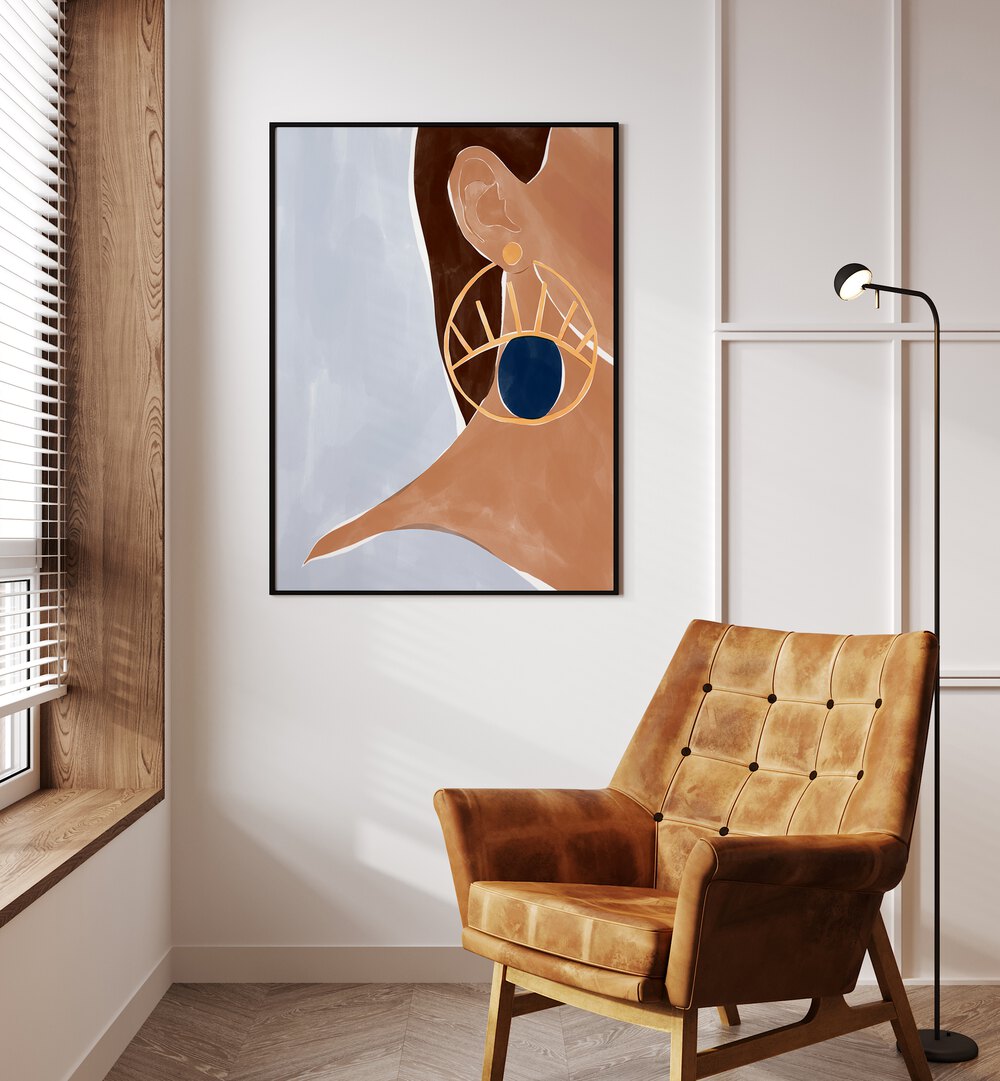 Evil Eye Earring By Ivy Green Women Illustration Paintings in Black Plain Frame on a white wall beside a window