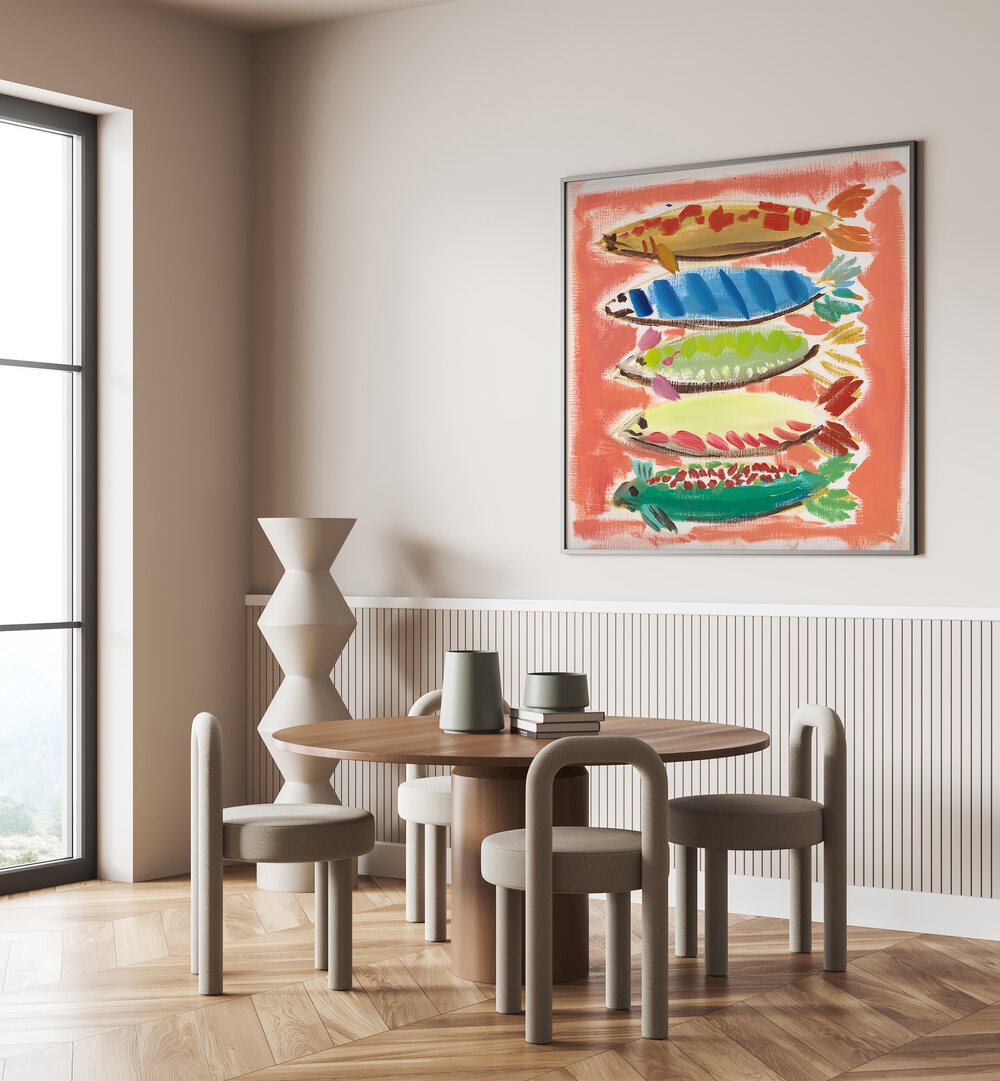 Colorful FIVE FISH, BEACH PAINTINGS displayed in a cozy dining area, enhancing coastal decor with vibrant charm.
