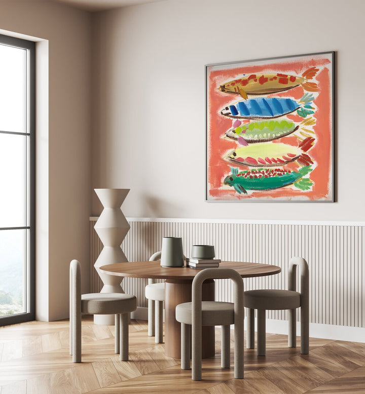 Colorful FIVE FISH, BEACH PAINTINGS displayed in a cozy dining area, enhancing coastal decor with vibrant charm.