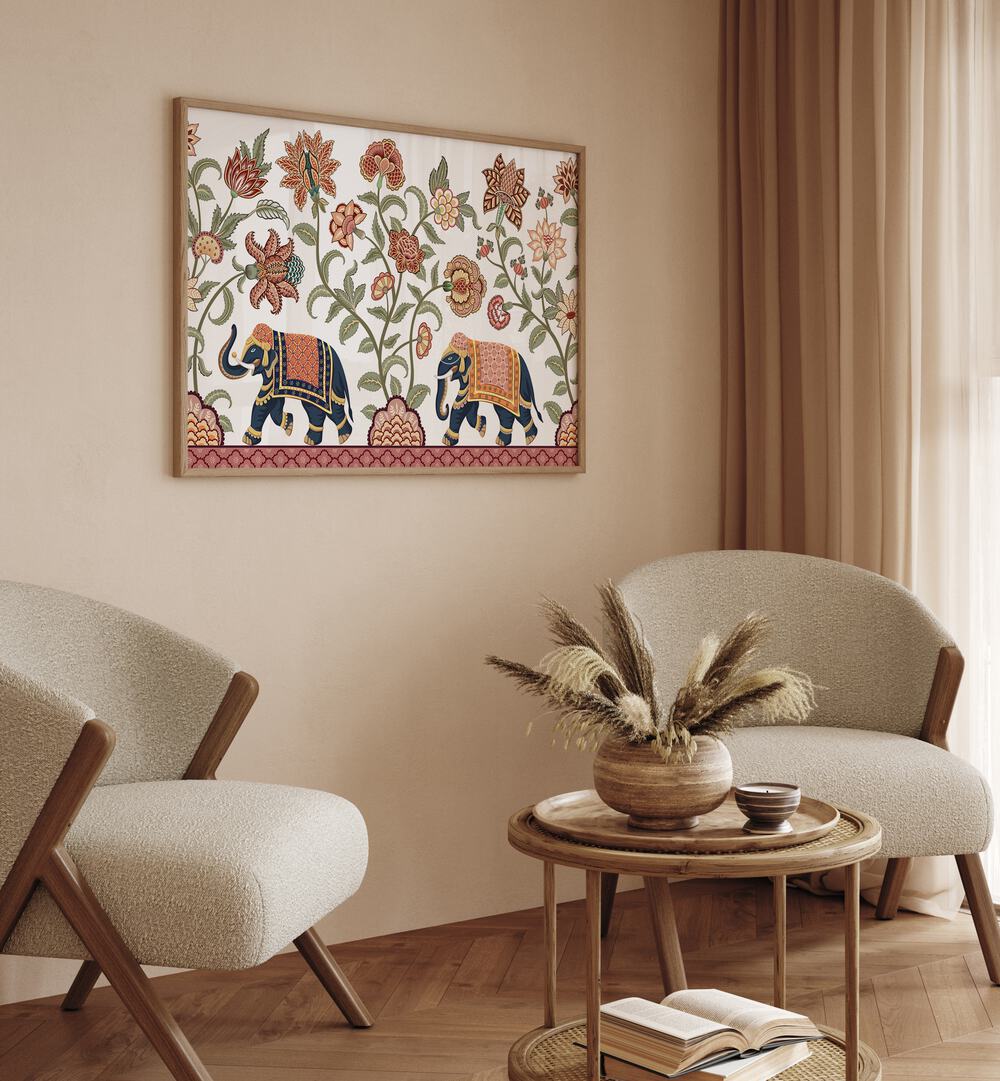 Floral Serenade Elephant's Symphony Indian Art Painting Artwork in Oak Wood Plain Frame placed on a Beige Wall near a Set of Beige Colored Chairs In the Drawing Room