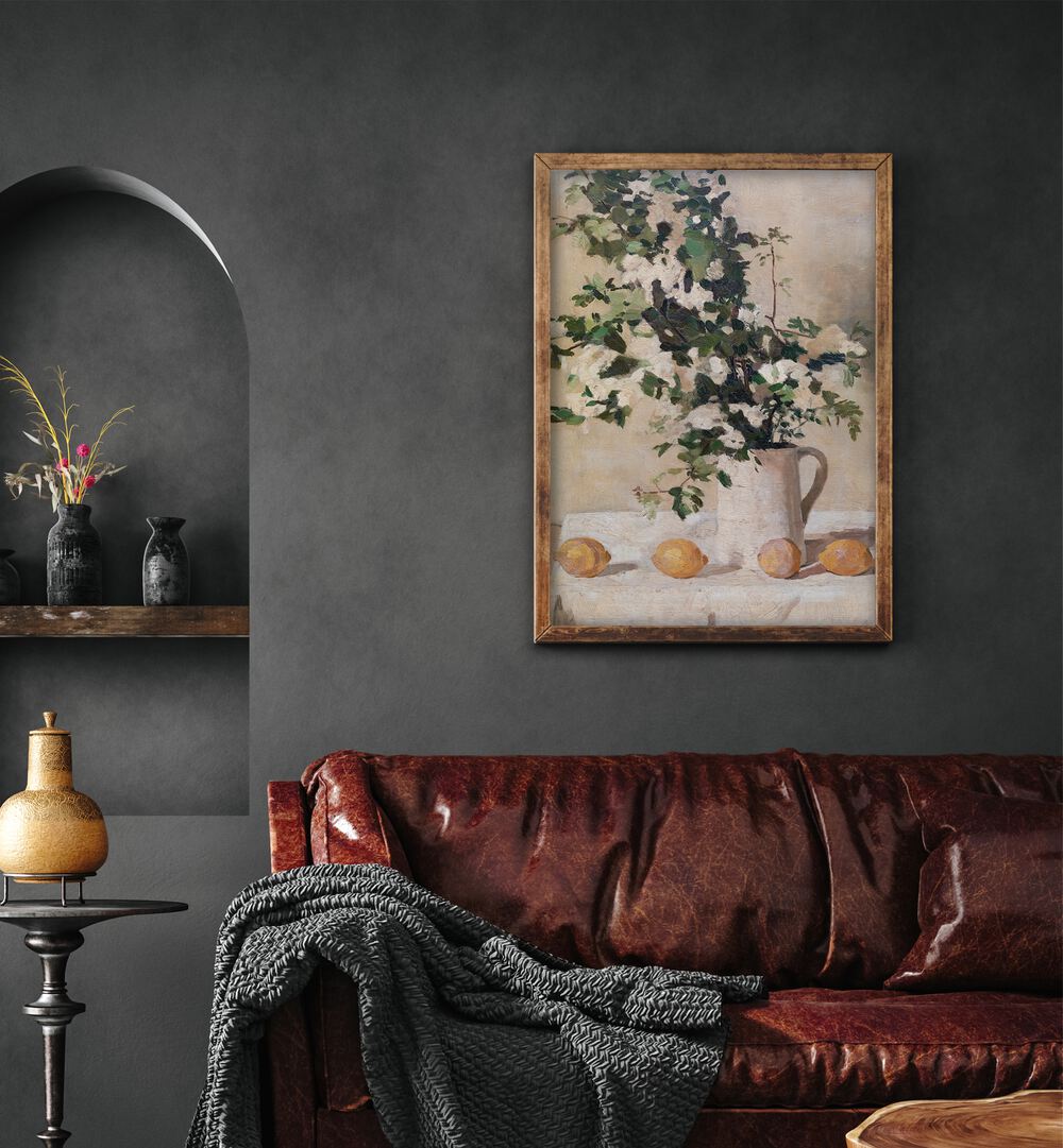 Flowers And Lemons Vintage Art Painting Artwork in plain oakwood frame behind a re sofa for living room