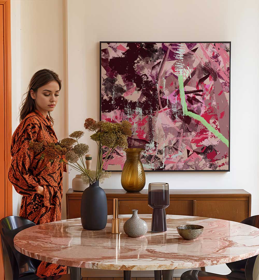 Stylish woman beside a table showcasing vibrant FOUR SEASON SUMMER, ABSTRACT PAINTINGS in an artistic living space.
