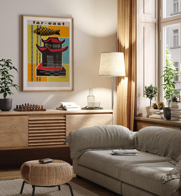 Far East  Travel Posters in Oak Wood Frame With Mount placed on a wall behind a console table