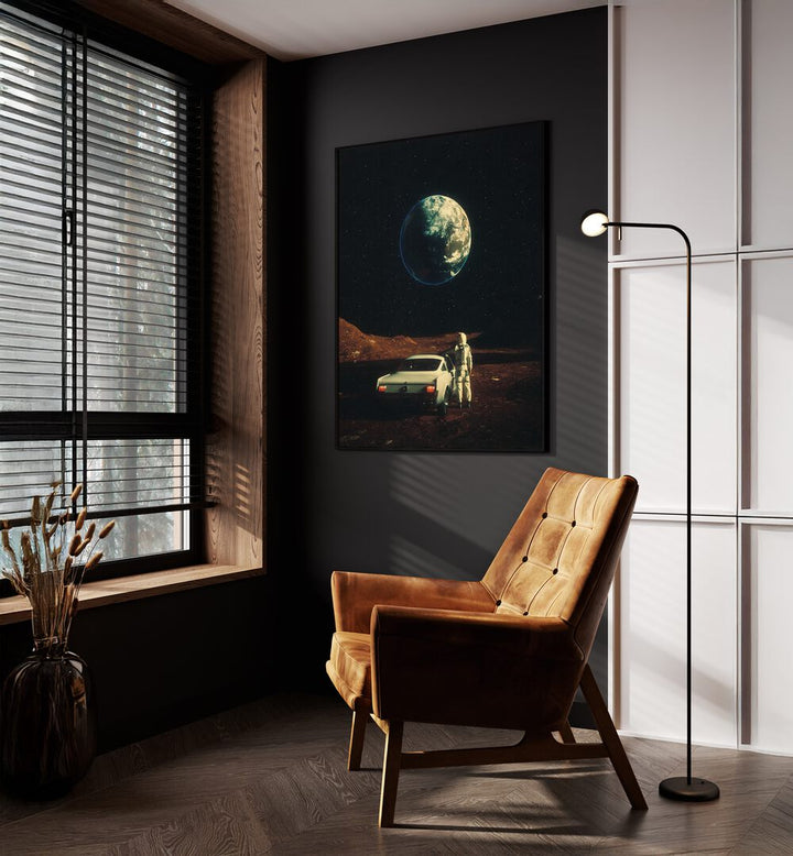 Far From Home Surreal Paintings Surreal Art Prints in Black Plain Frame placed on a Dark Grey Colored Wall near a Brown Sofa Chair in the Drawing Room