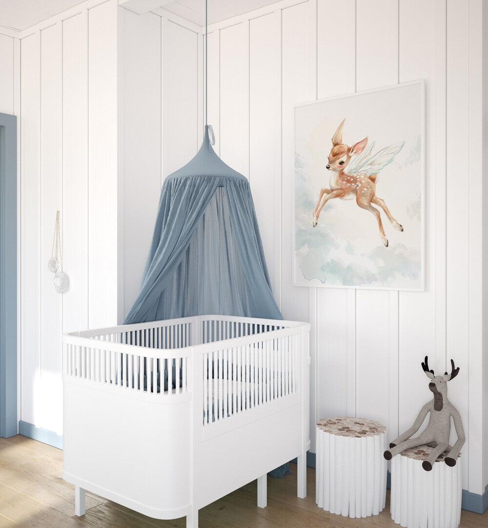 Fawn Fairy Frolic I Kids Room Paintings Kids Room Wall Art in White Plain Frame placed on a wall in a kids room beside an infant's bed