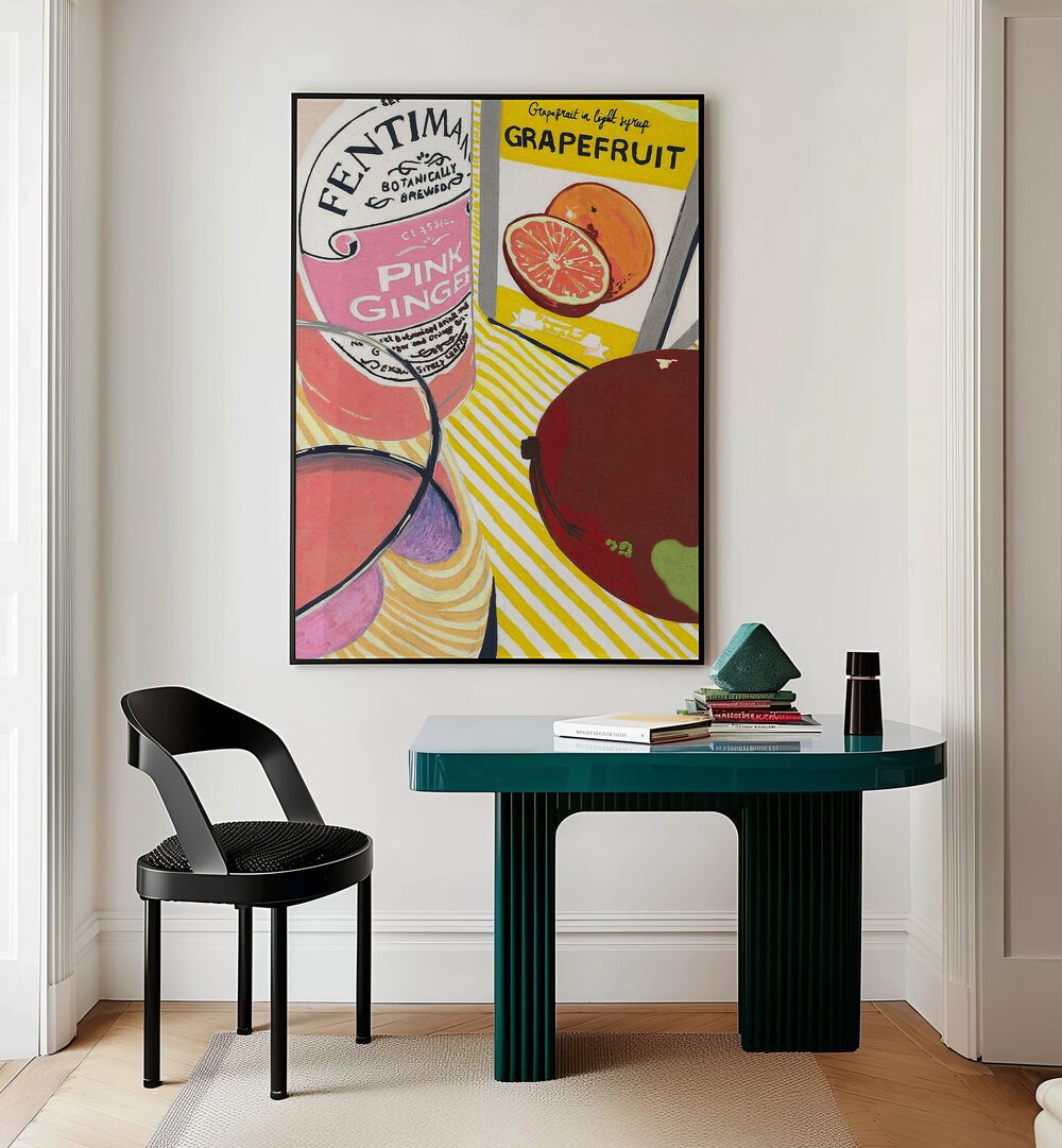 Fentima Grapefruit by Studio Mandariini Kitchen Posters Kitchen Art Prints in Black Plain Frame placed on a wall behind a study table