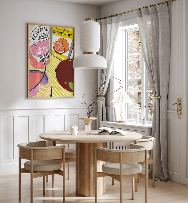 Fentima Grapefruit by Studio Mandariini Kitchen Posters Kitchen Art Prints in Oak Wood Plain Frame placed on a wall in dining room area beside a window and behind a dining table