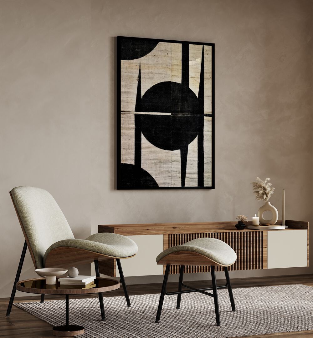 Fixed Circle By Treechild Abstract Paintings in Black Plain Frame placed on a Beige Colored Wall above a Console Table in the Drawing Room