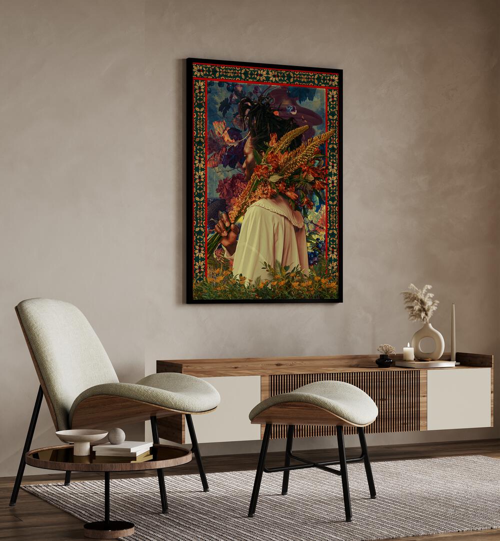 Flower Boy By Cosmo Zach Surreal Art Prints Surrealism in Black Plain Frame placed on the wall behind a console table and beside a chair