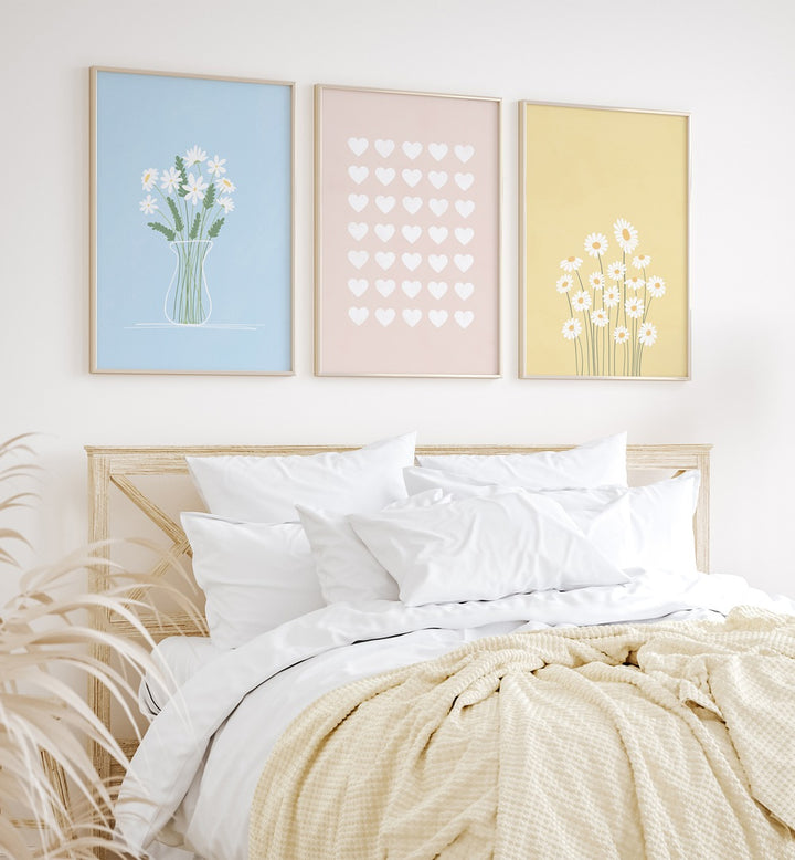 Flower Silhouettes Set Of 3 Paintings in Oak Wood Plain Frame placed behind a bed for bedroom