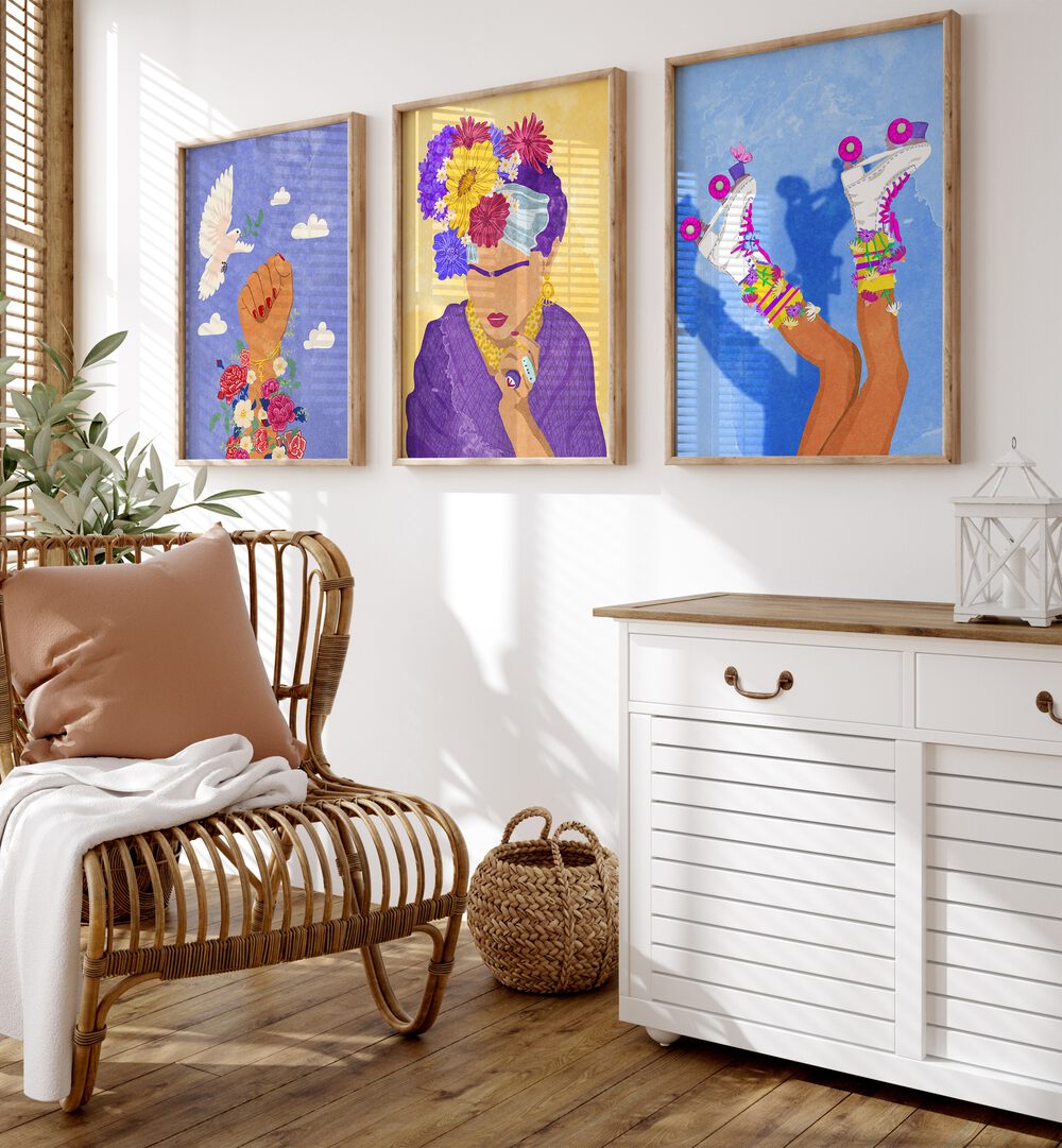 Flowers On A Good Day Set Of 3 Paintings in Oak Wood Plain Frame placed on a wall beside a chair and a console table