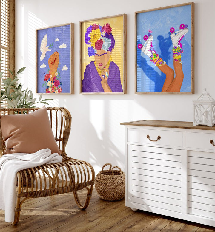 Flowers On A Good Day Set Of 3 Paintings in Oak Wood Plain Frame placed on a wall beside a chair and a console table