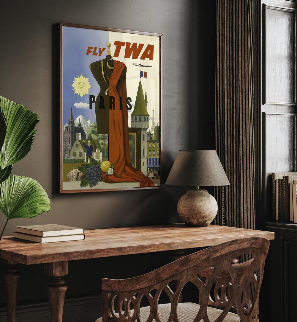 Fly Twa-paris Retro Vintage Travel Travel Posters in Dark Wood Plain Frame on a wall above a study table beside a lamp