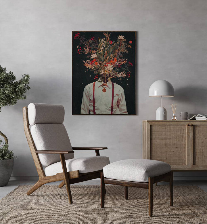 Foliage By Frank Moth Surreal Art Prints Surrealism in Black Plain Frame placed on a wall behind a chair 