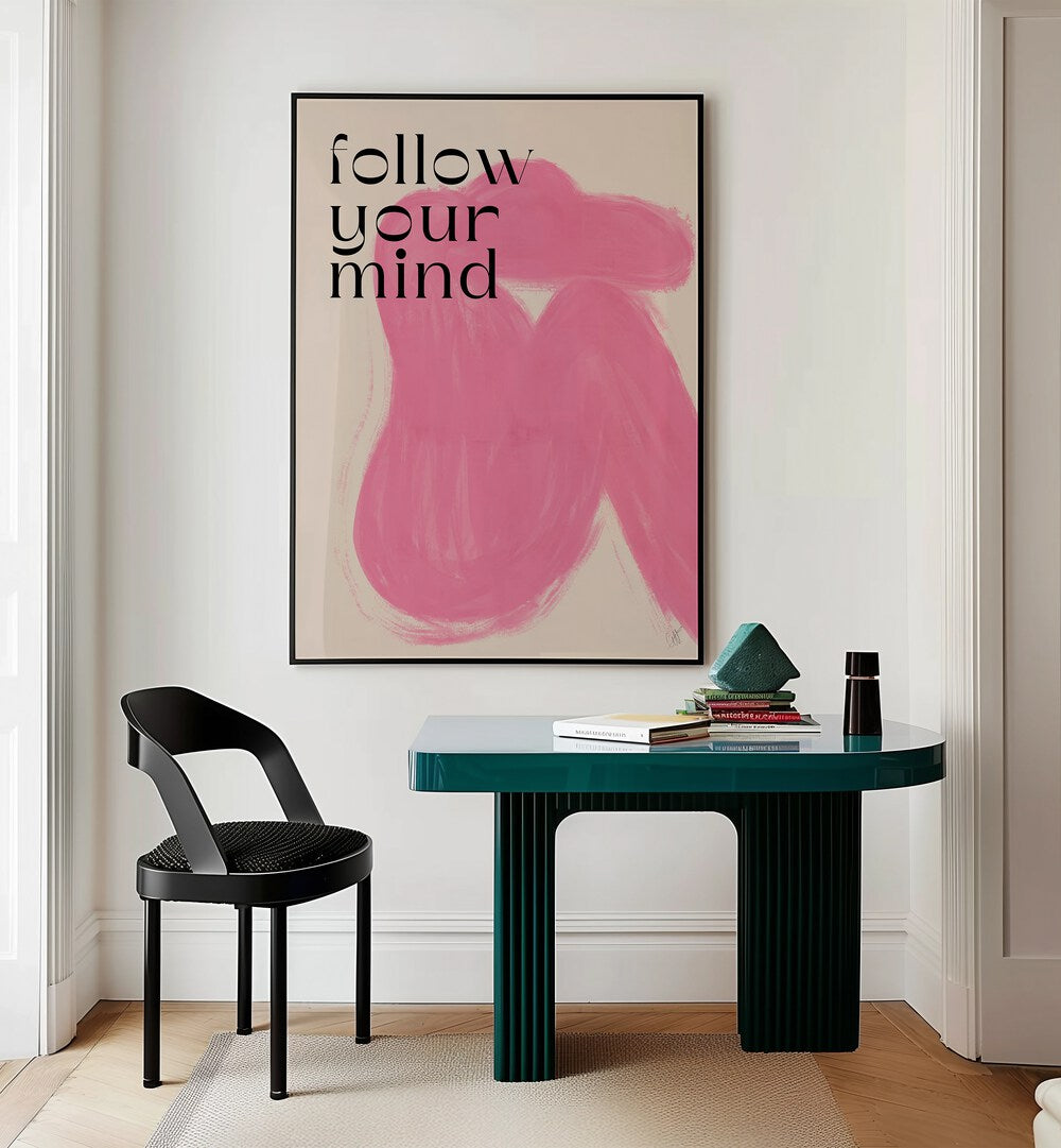 Follow Your Mind by Anne-marie Volfova Quotes and Typography Posters in Black Plain Frame placed on a wall behind a study table