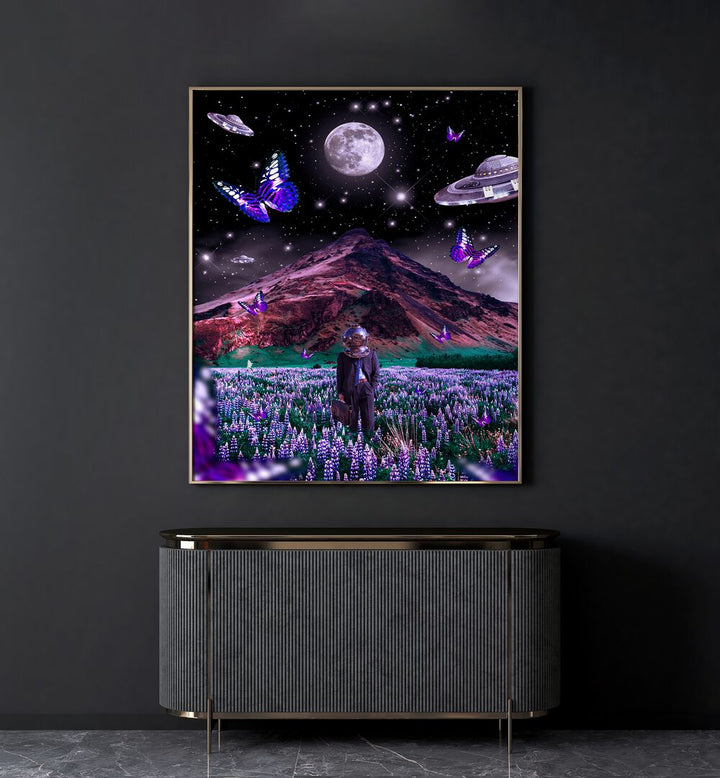 Foreign Soil By Ritvik Takkar Surreal Art Prints in Gold Plain Frame placed on a Dark Grey Colored Wall above a Console Table in the Drawing Room