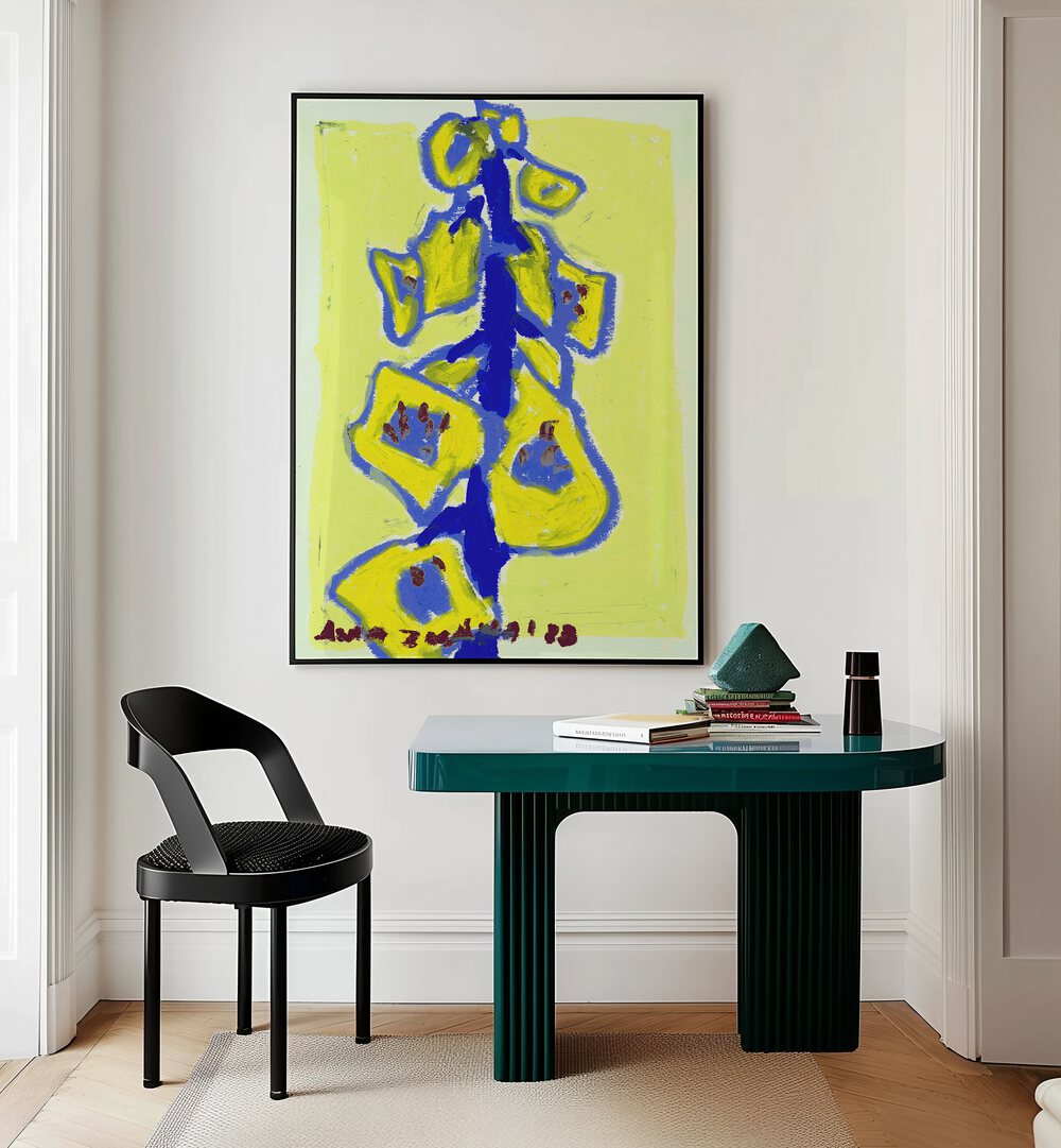 Foxgloves Yellow By Ania Zwara Botanical Art Prints Floral Paintings in Black Plain Frame placed on a Cream Colored Wall near a Table in a Workspace in the Drawing Room