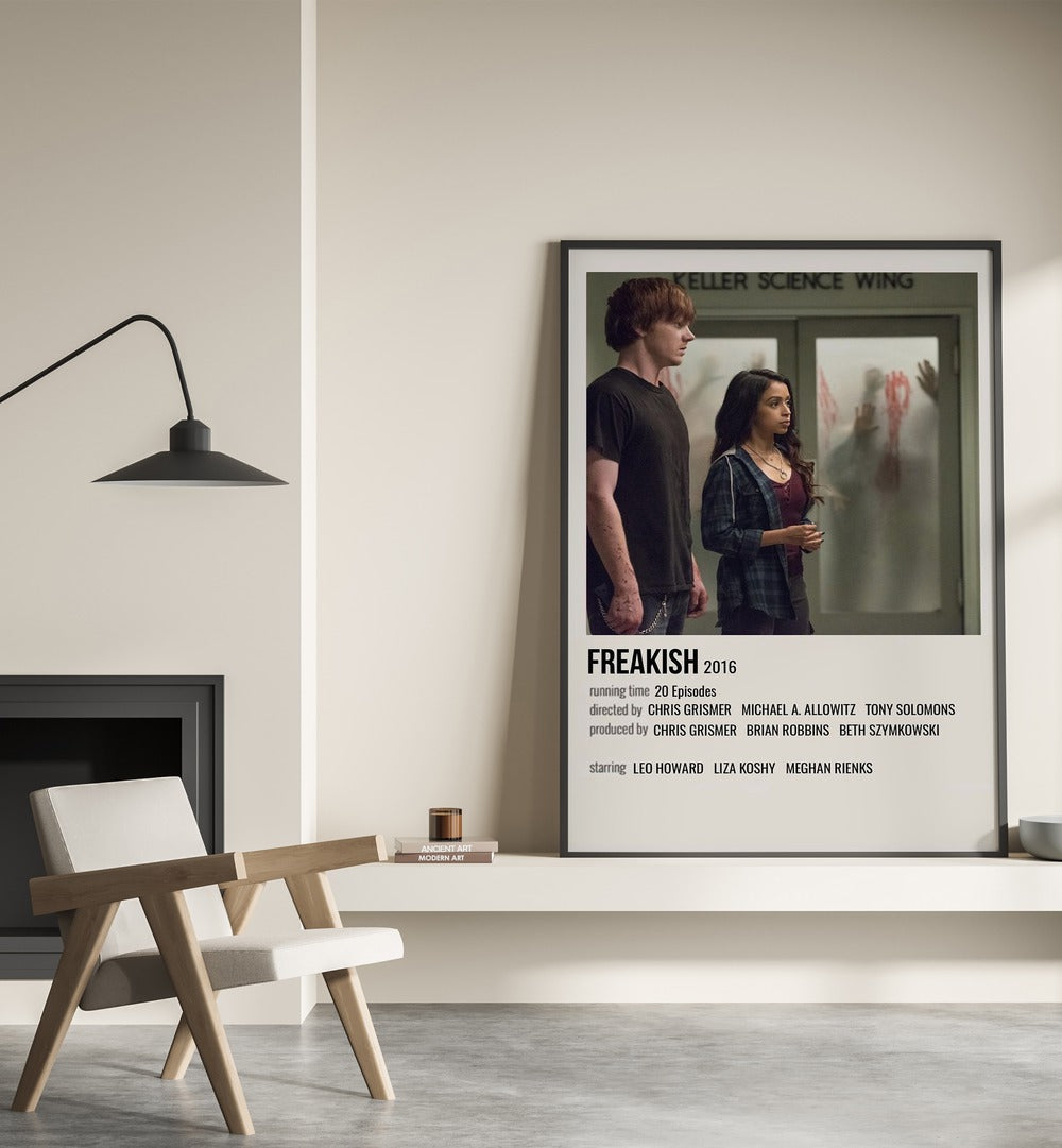 Freakish 2016 Movie Posters in Black Plain Frame placed on a shelf beside a hearth