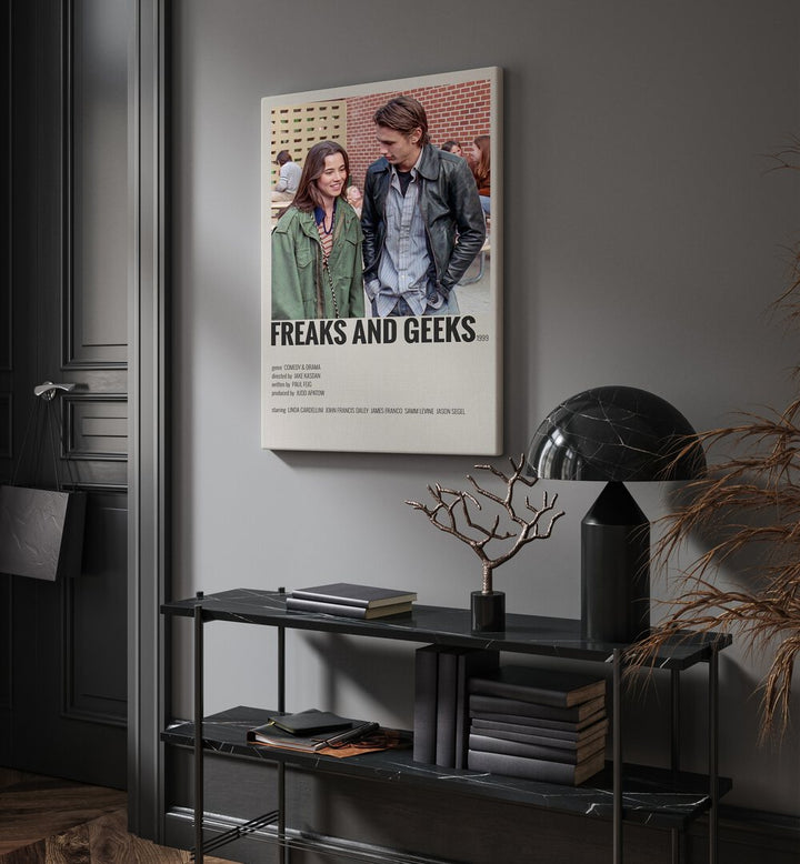 Freaks And Greaks Movie Posters in Gallery Wrap placed on a wall behind a table and beside a door