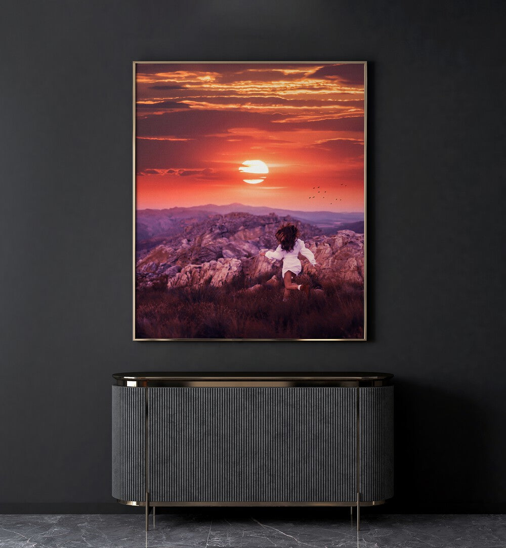 Free Spirit By Ritvik Takkar Surreal Art Prints in Gold Plain Frame placed on a Dark Grey Colored Wall above a Console Table in the Drawing Room