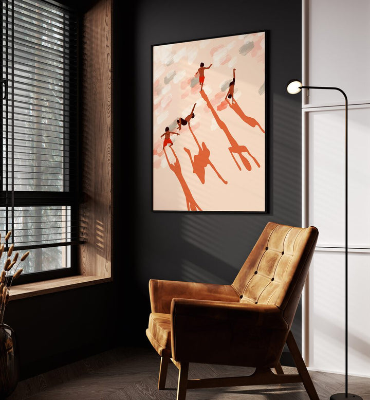 Free Spirits By Uma Gokhale Kids Room Art Prints in Black Plain Frame on a wall beside an orange sofa