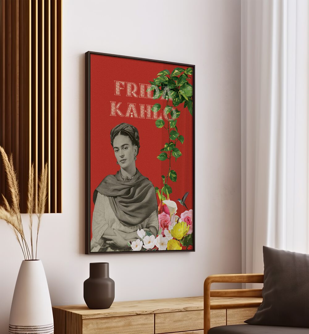 Frida Kahlo By Grishma Korjani Artist Tribute Posters in Black Plain Frame placed on a Cream Colored Wall above a Console Table 