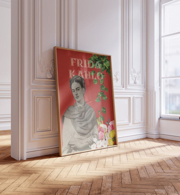 Frida Kahlo By Grishma Korjani Artist Tribute Posters in Oak Wood Plain Frame placed on a Floor near a White Colored Wall