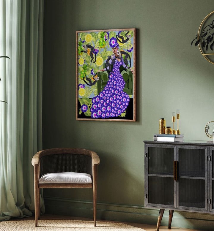 Frida in the Garden By Lynnda Rakos Pop Art Paintings Pop Art Prints in Oak Wood Plain Frame placed on a wall behind a chair