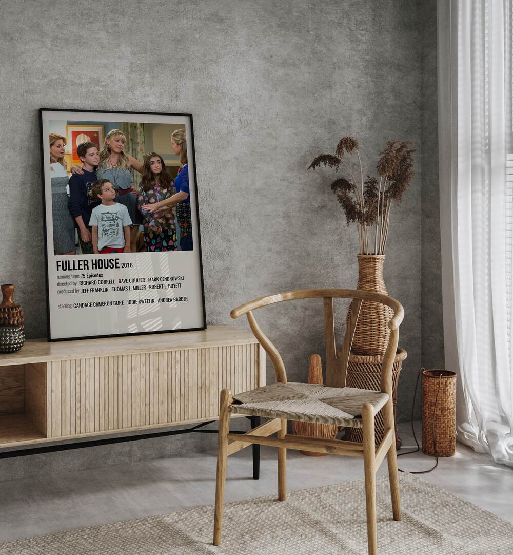Fuller House 2016 Movie Posters in Black Plain Frame placed on a console behind a chair