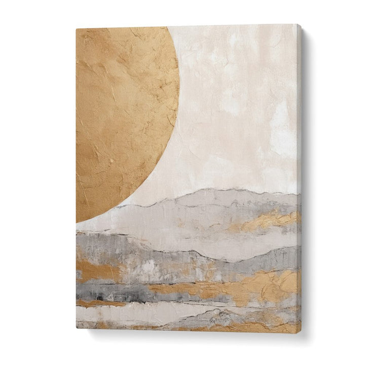 Abstract canvas wall art featuring a large textured gold semicircle, a pale cream sky-like area, and layered gray and gold mountain bands near the bottom, shown as a gallery-wrapped canvas on a white background.