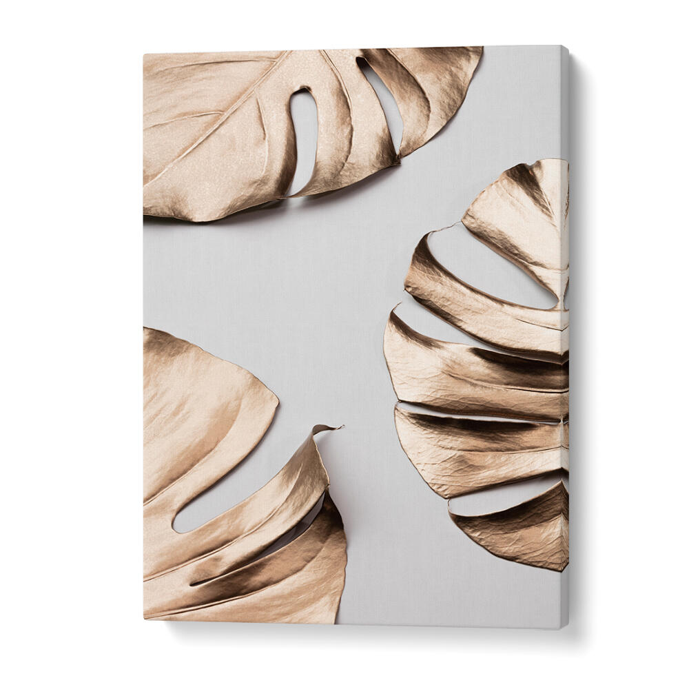 Stylish MONSTERA GOLD I, FASHION POSTERS featuring elegant gold leaves for a chic, modern decor enhancement.