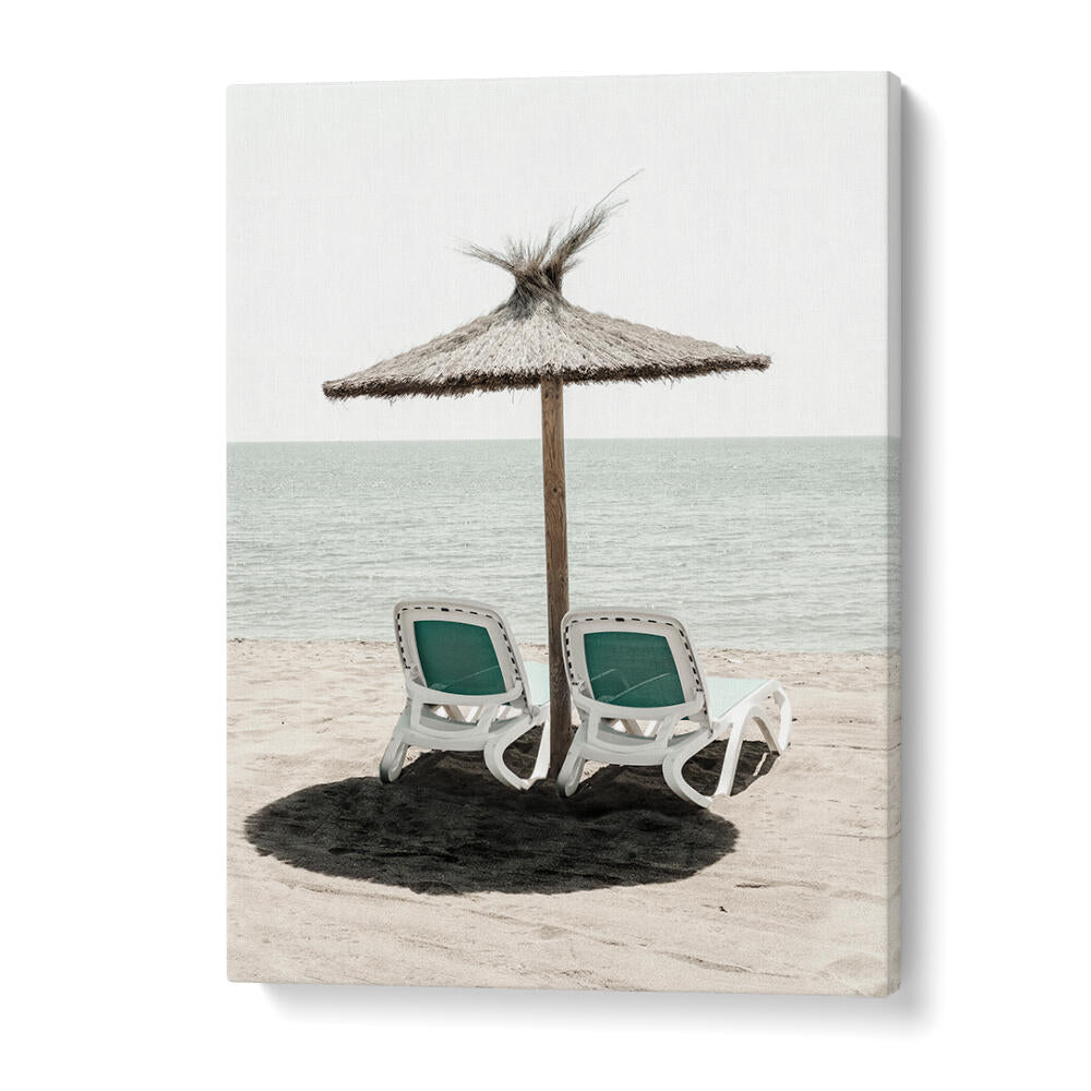 Relaxing scene of beach chairs under a straw umbrella, featuring SOLARIS II, BEACH PAINTINGS for a serene home vibe.