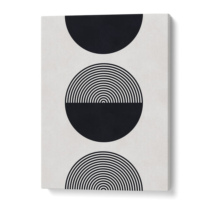 Bold black and white design featuring concentric circles, perfect for modern decor. Explore SHAPES XI, GEOMETRIC ART PRINTS.