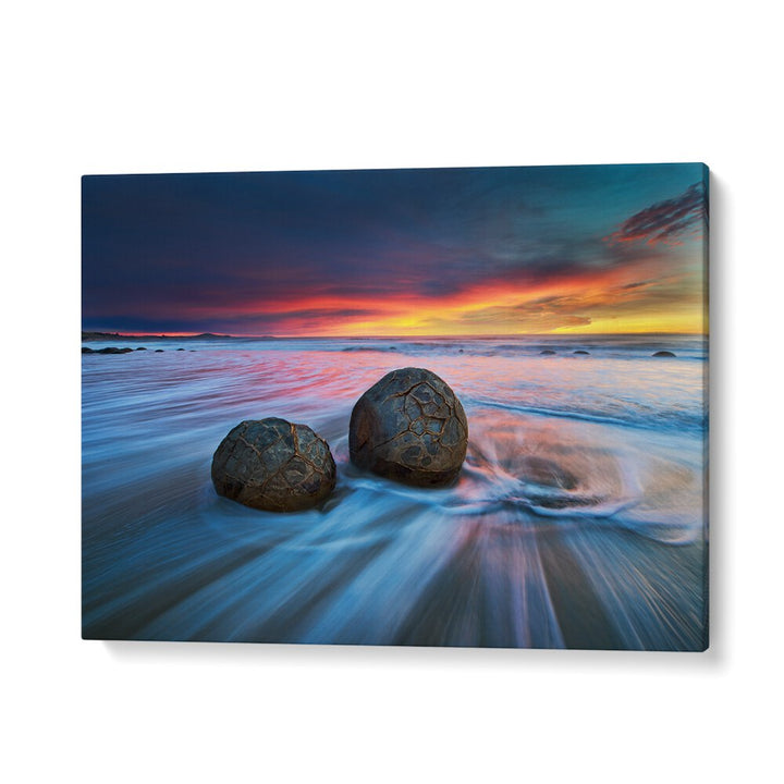 Stunning Moeraki Boulders at sunset, perfect for your collection of MOERAKI BOULDERS, PHOTOGRAPHY PRINTS.