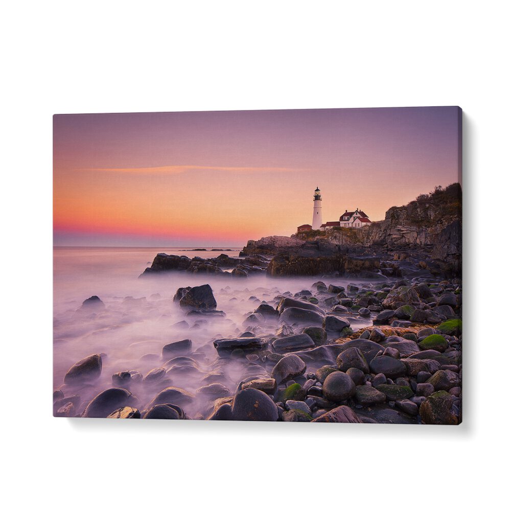 Stunning Portland Headlight photography prints capture the iconic lighthouse on the rugged coastline at sunset.