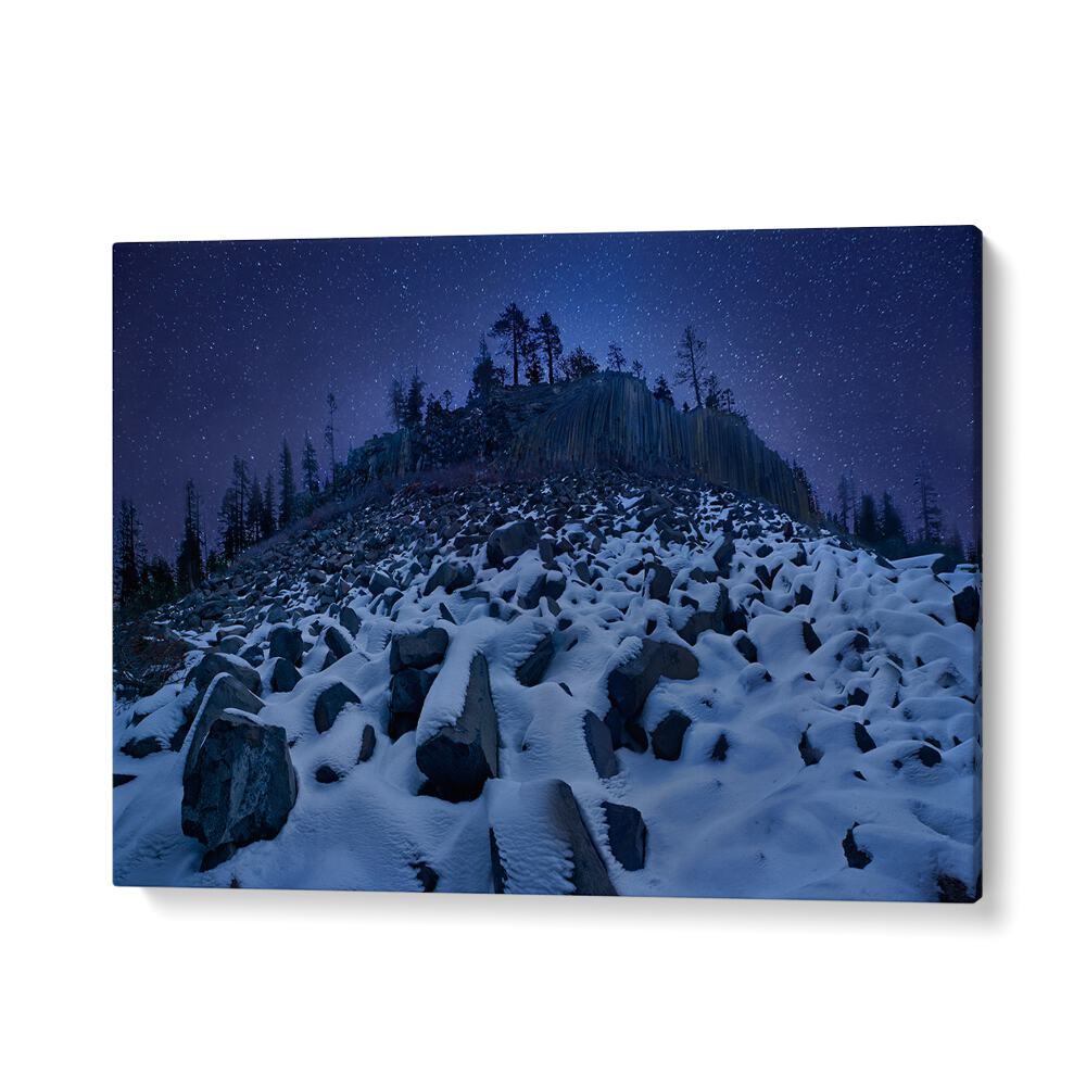 Breathtaking COLD MOUNTAIN DEVILS POSTPILE photography prints showcasing a stunning snowy landscape under a starry sky.