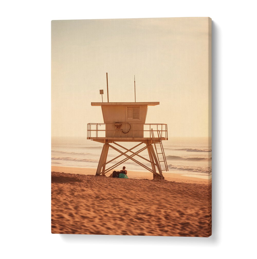 Couple enjoying a serene sunset by the lifeguard tower in OCEANFRONT, BEACH PAINTINGS by Philippe Hugonnard.