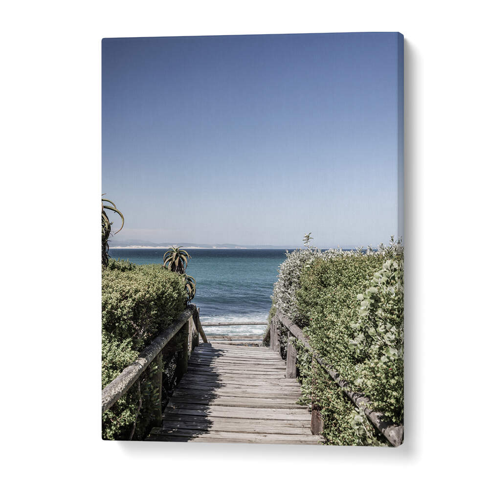 SEASIDE TRANQUILITY , BEACH PAINTINGS wooden boardwalk framed by shrubs leading to calm turquoise ocean.