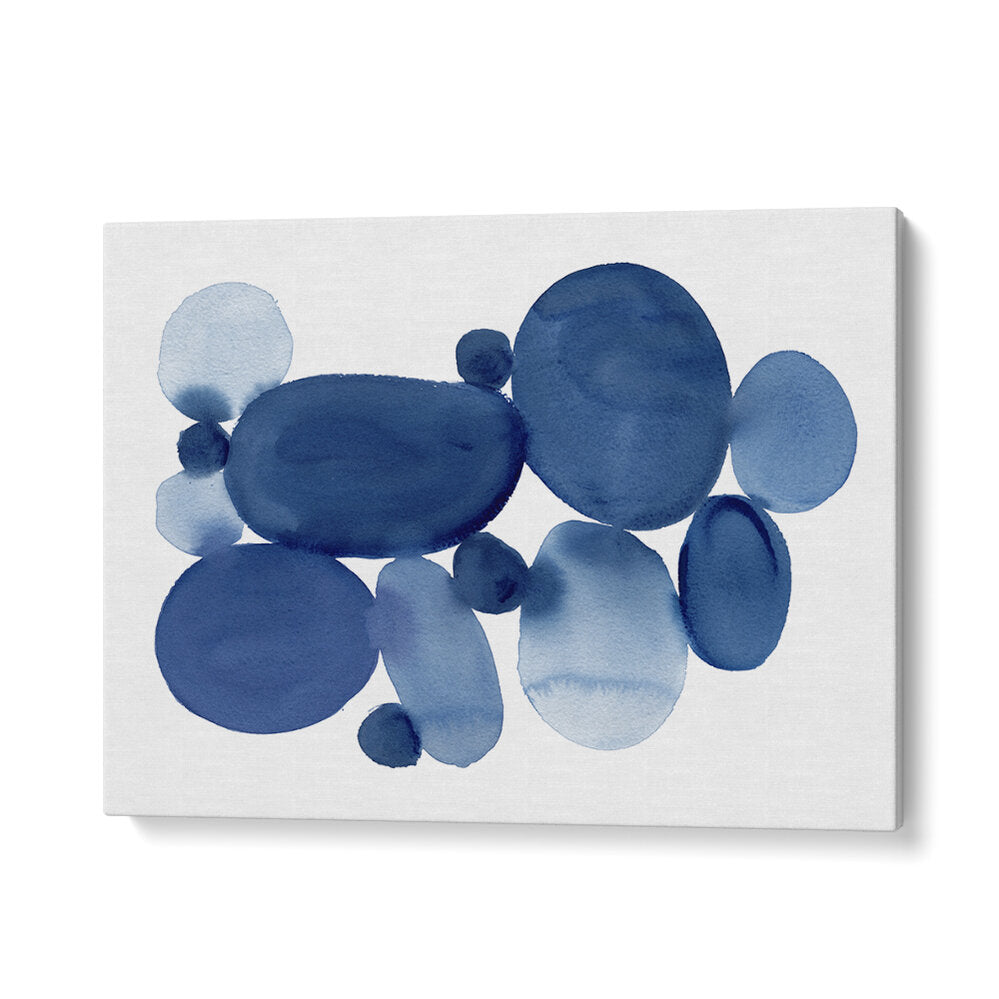 Elevate your decor with BLUE WATERCOLOR STONES I, ABSTRACT PAINTINGS showcasing serene blue hues and fluid shapes.