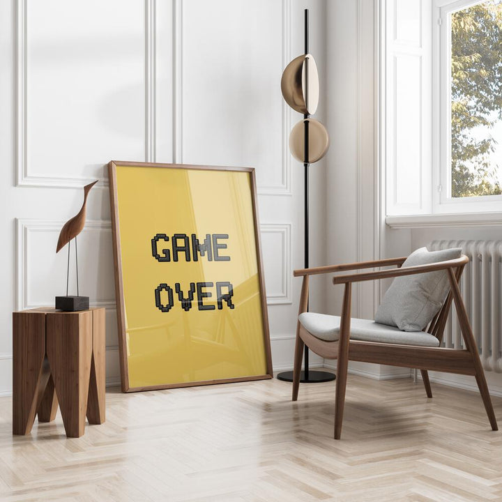 Game Over Gaming Art Painting Artwork in plain oakwood frame beside a table