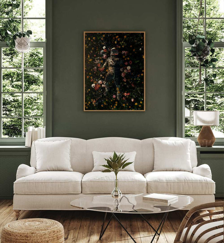 Garden Delights By Francis Minoza Astronaut & Nasa Paintings, Space Art Prints Artwork in Oak Wood Plain Frame placed on a Green Wall near a White Sofa in the Living Room