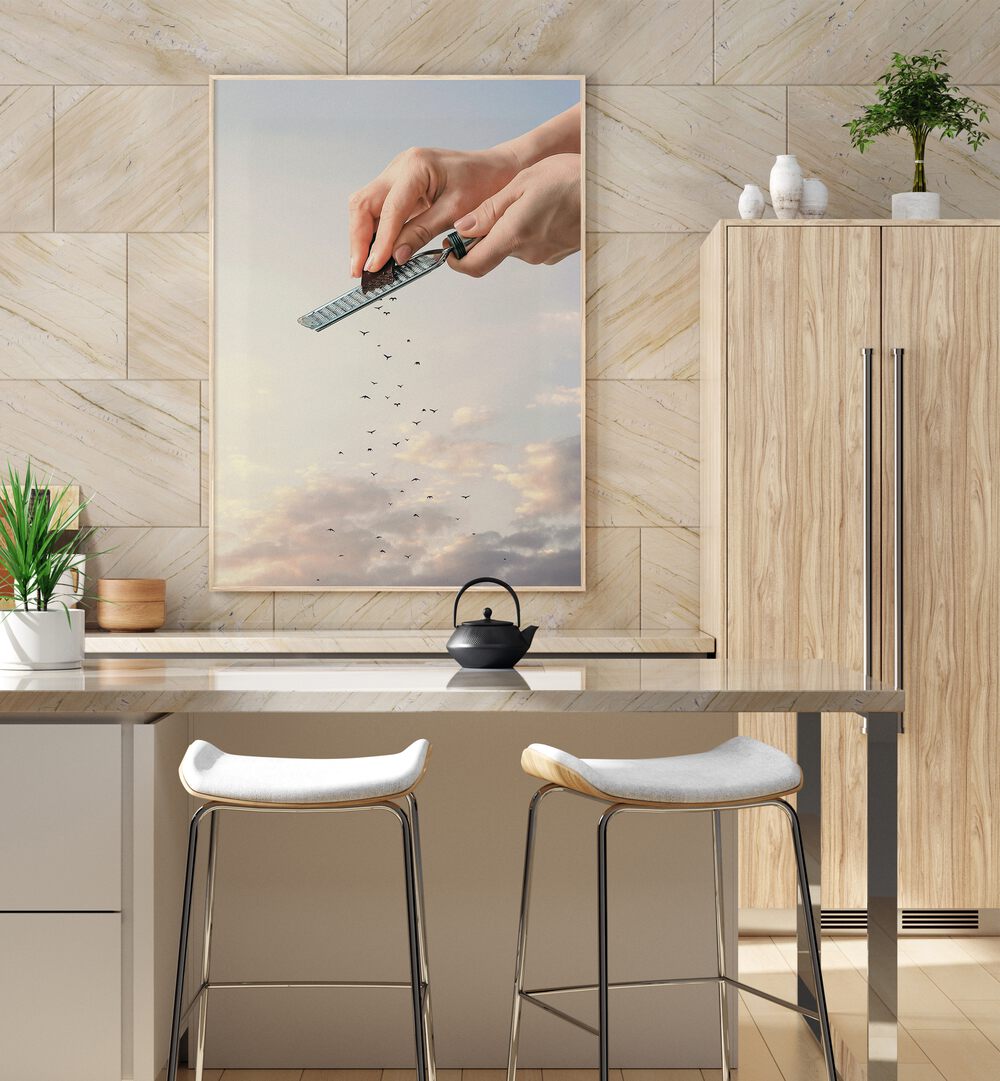 Garnished Flock Surreal Art Painting Artwork in plain white frame on kitchen counter beside a cupboard