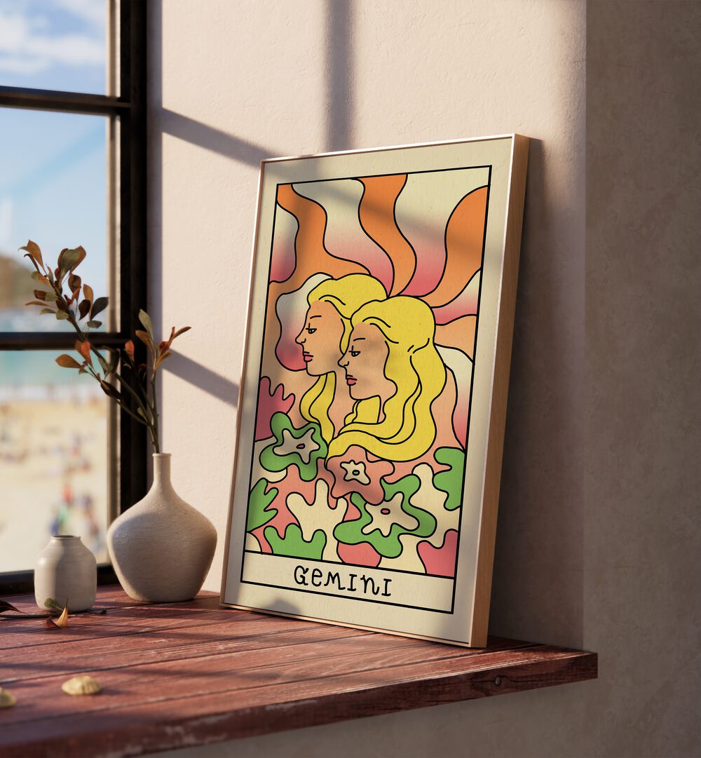 Gemini Zodiac & Tarot Art Painting Artwork in plain oakwood frame beside a window