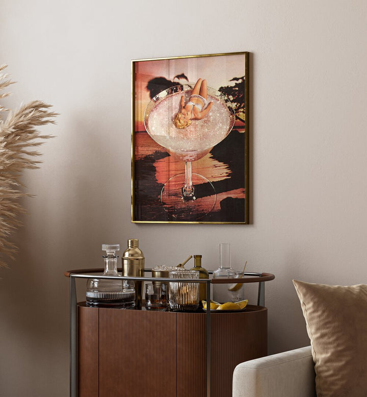 Glitter Pink Margarita Surreal Art Painting Artwork in plain golden frame above a table on a beige wall beside a sofa